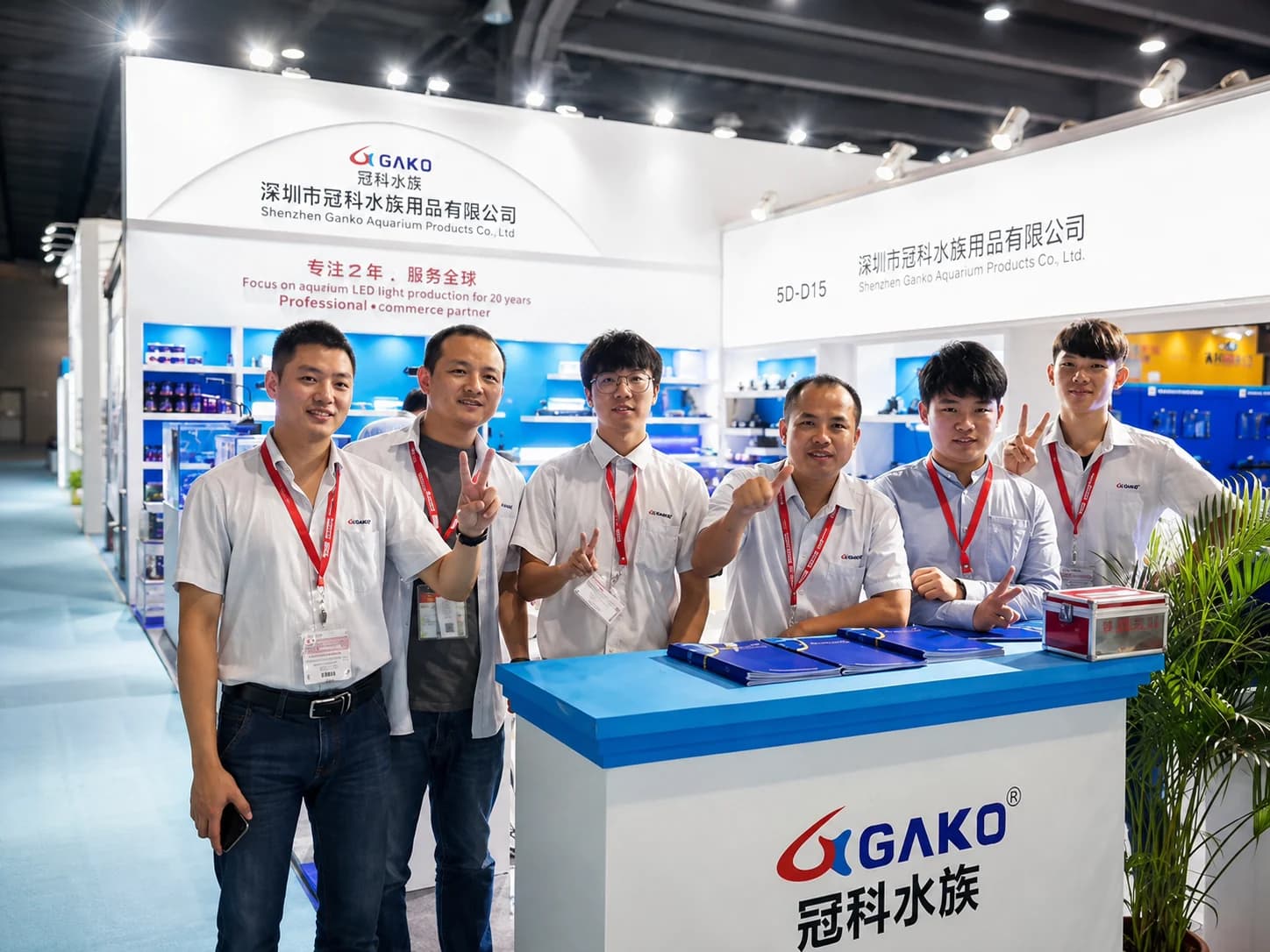 Six members of the GAKO team at an aquarium products exhibition