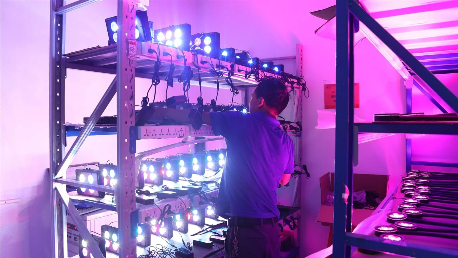 GAKO technician evaluating aquarium lights